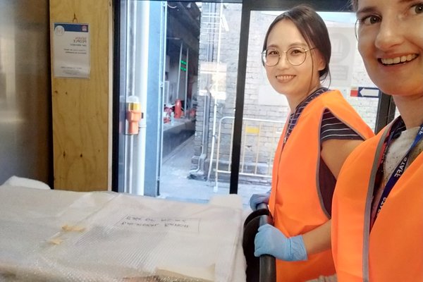 Clare Kim and Rebecca Jones carefully moving some items into the CC&C lab via the service lift. Photos taken prior to Covid-19 mask restrictions and lockdown.